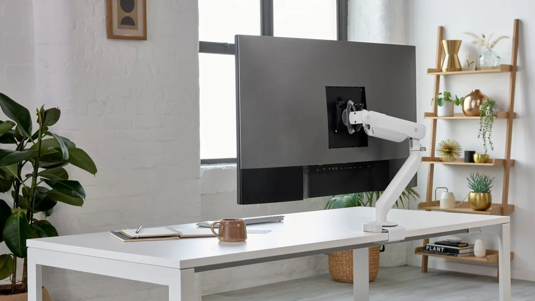 CBS Flo X monitor arm supporting a large curved ultrawide screen in a home office - Chair Dinkum Australia