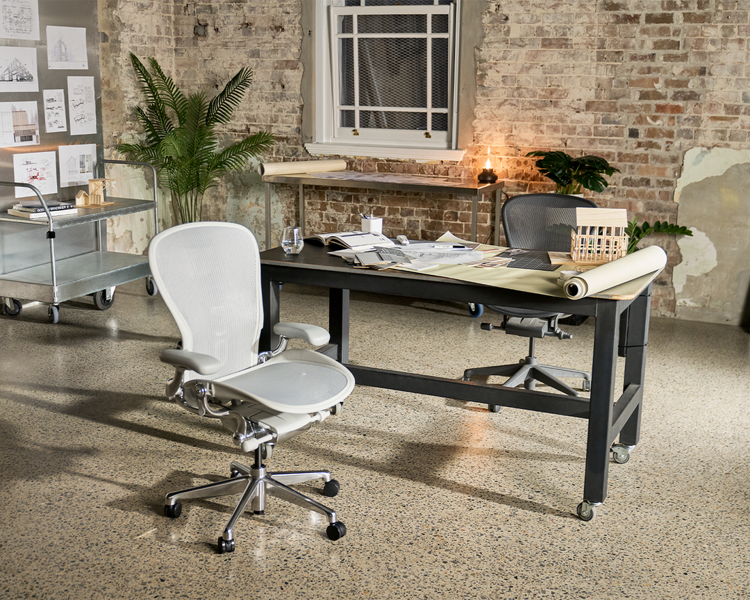 Herman Miller Aeron at a sit-to-stand desk in an architectural workspace - Chair Dinkum Australia