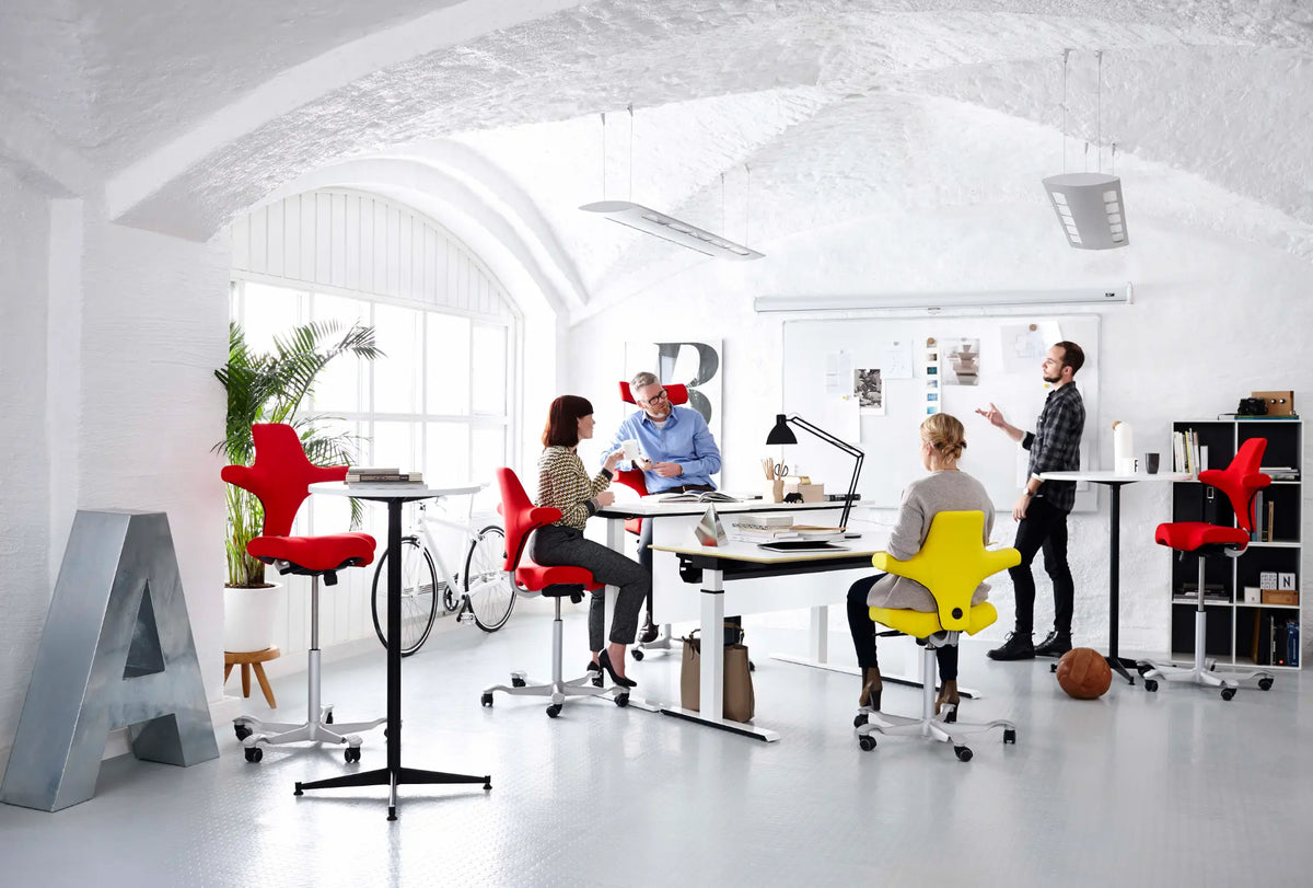 HÅG Capisco saddle chairs in a modern office