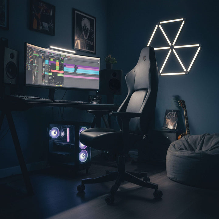 Buro x PowerA Navigator gaming chair in a dark gaming and streaming room