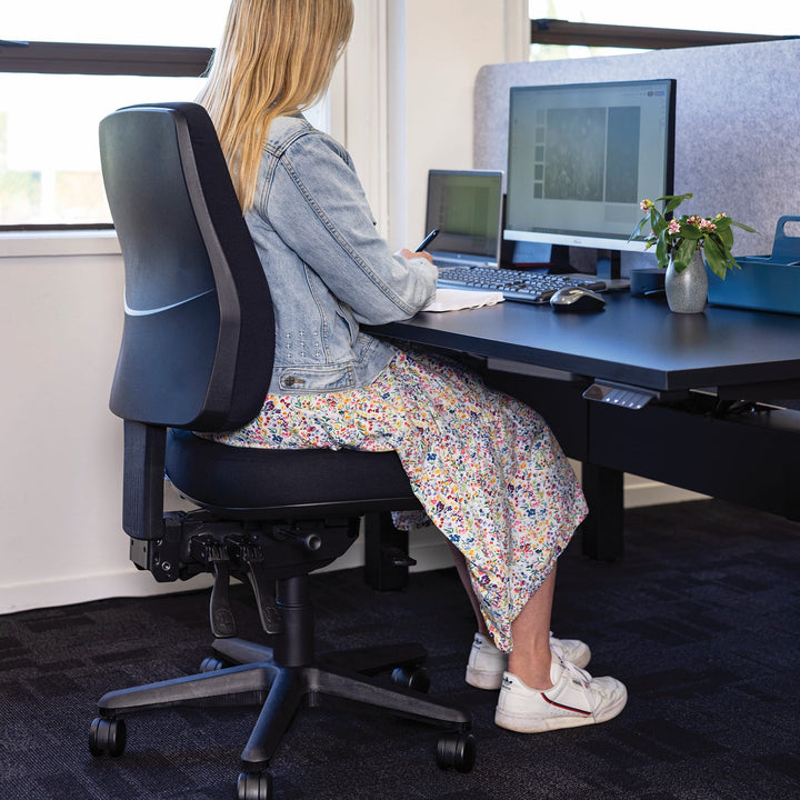 Buro Roma 3 lever high back chair with seat slide, black, at a desk (Buro Seating photograph)