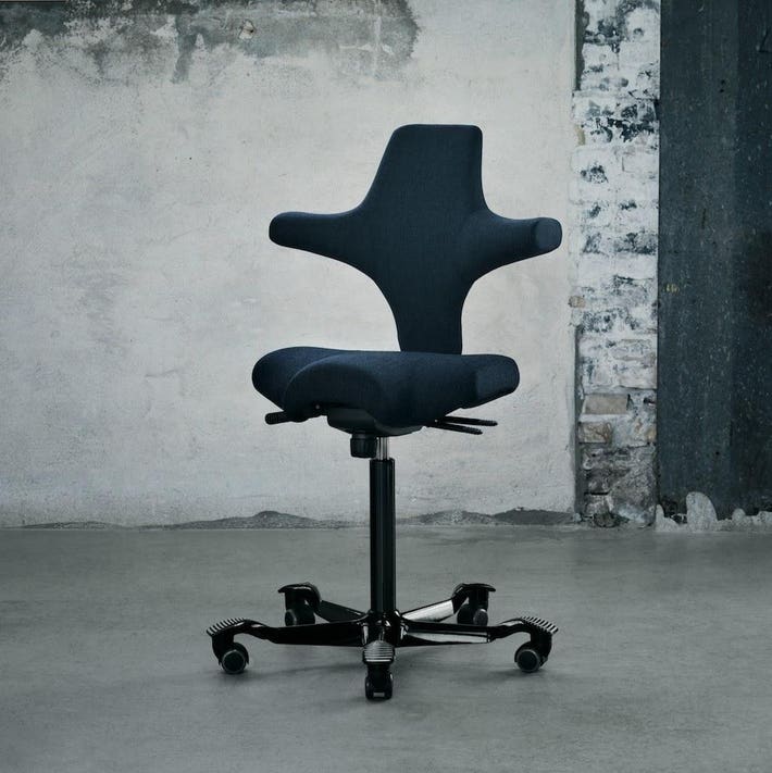 HAG Capisco chair demonstrating active sitting and movement - Chair Dinkum Australia