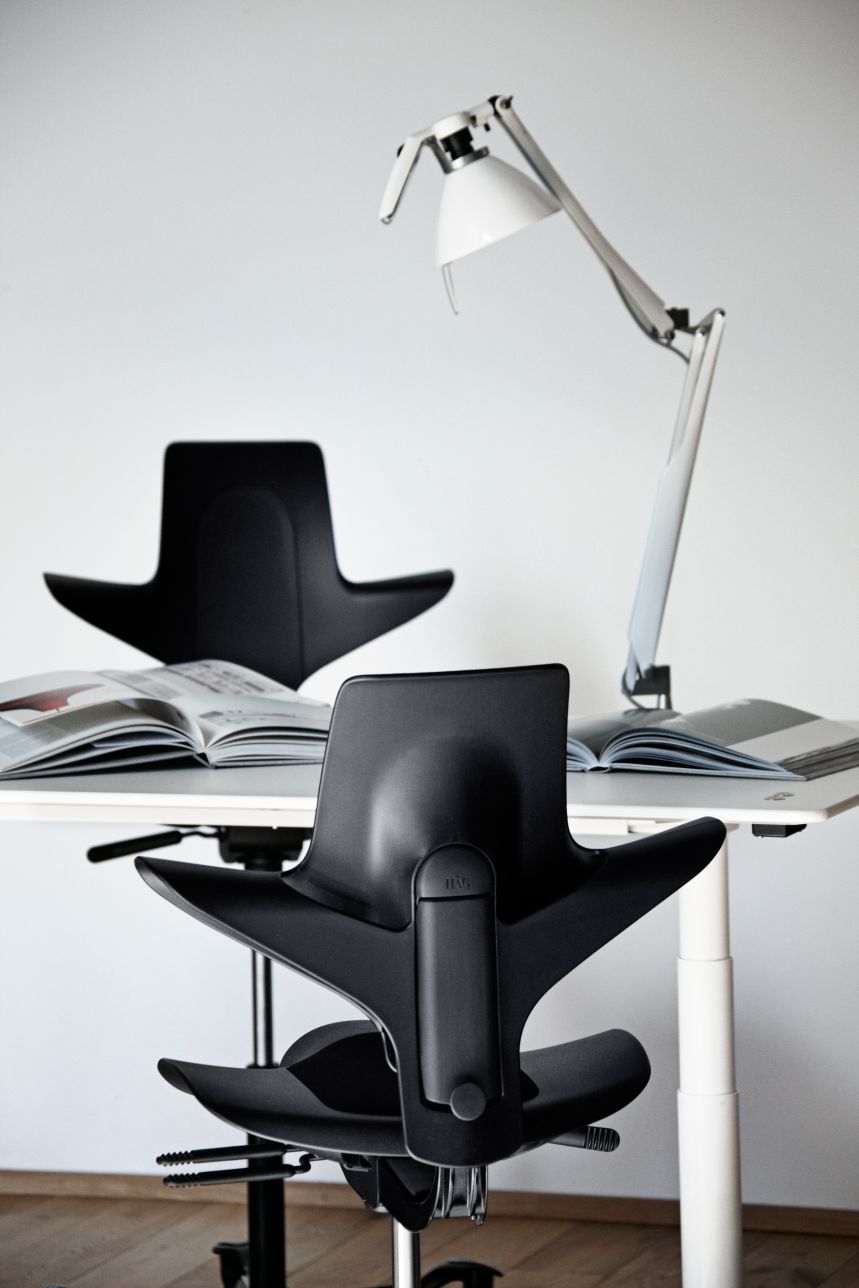 Young person using HAG Capisco Puls 8010 at colourful study desk - Chair Dinkum Australia