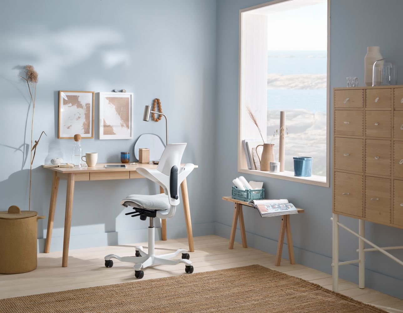 HAG Capisco 8106 in home office with standing desk setup - Chair Dinkum Australia