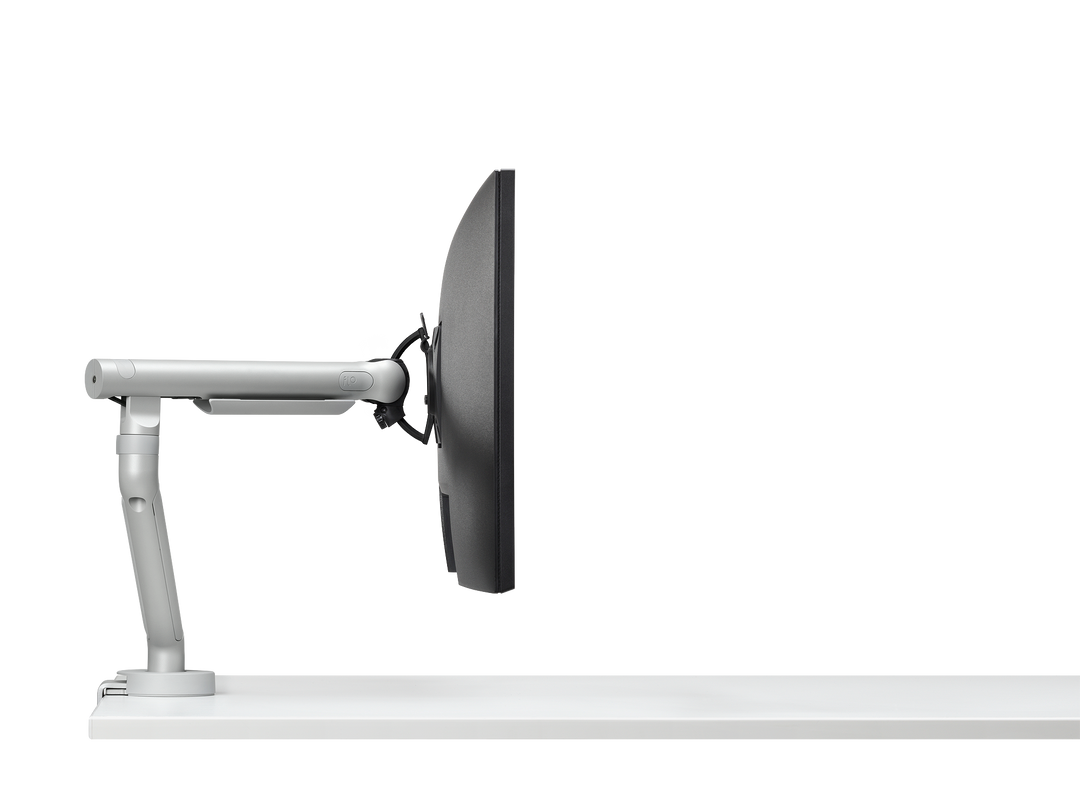 Colebrook Bosson Saunders Flo monitor arm in silver, no screen, three-quarter view, studio (Colebrook Bosson Saunders photograph)