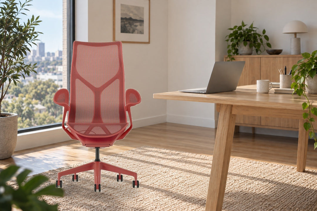 Herman Miller Cosm high back chair in Canyon with Leaf Arms on a rug beside a timber desk in a sunlit apartment office - Chair Dinkum Australia