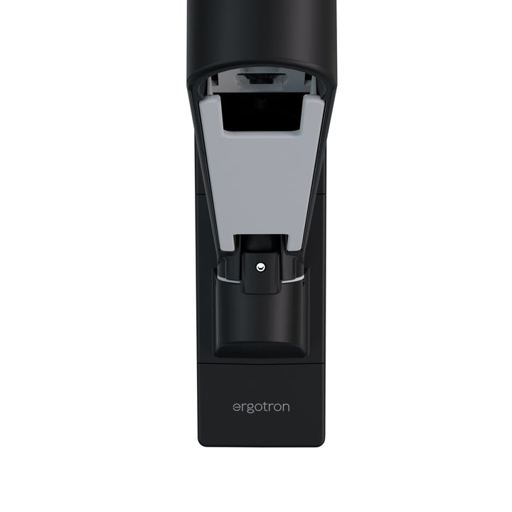 Rotation stop on the wall base of a matte black Ergotron LX Pro arm