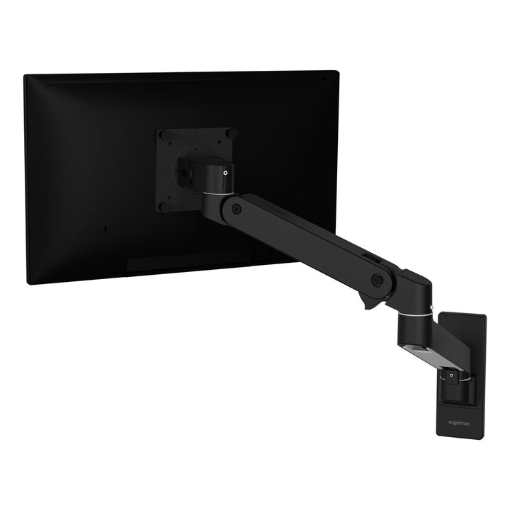 Ergotron LX Pro Wall Monitor Arm in matte black, rear view showing the wall base and VESA plate