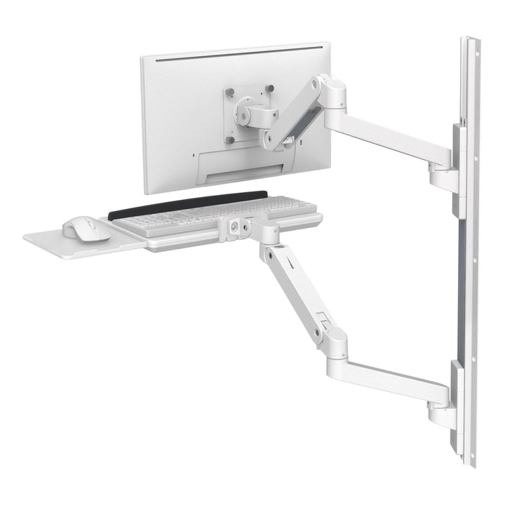 Ergotron LX Pro Wall Mount System in white, rear three-quarter view showing the monitor arm, keyboard arm and wall track