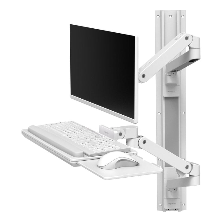 Ergotron LX Pro Wall Mount System in white with a screen, keyboard tray and mouse tray on a wall track