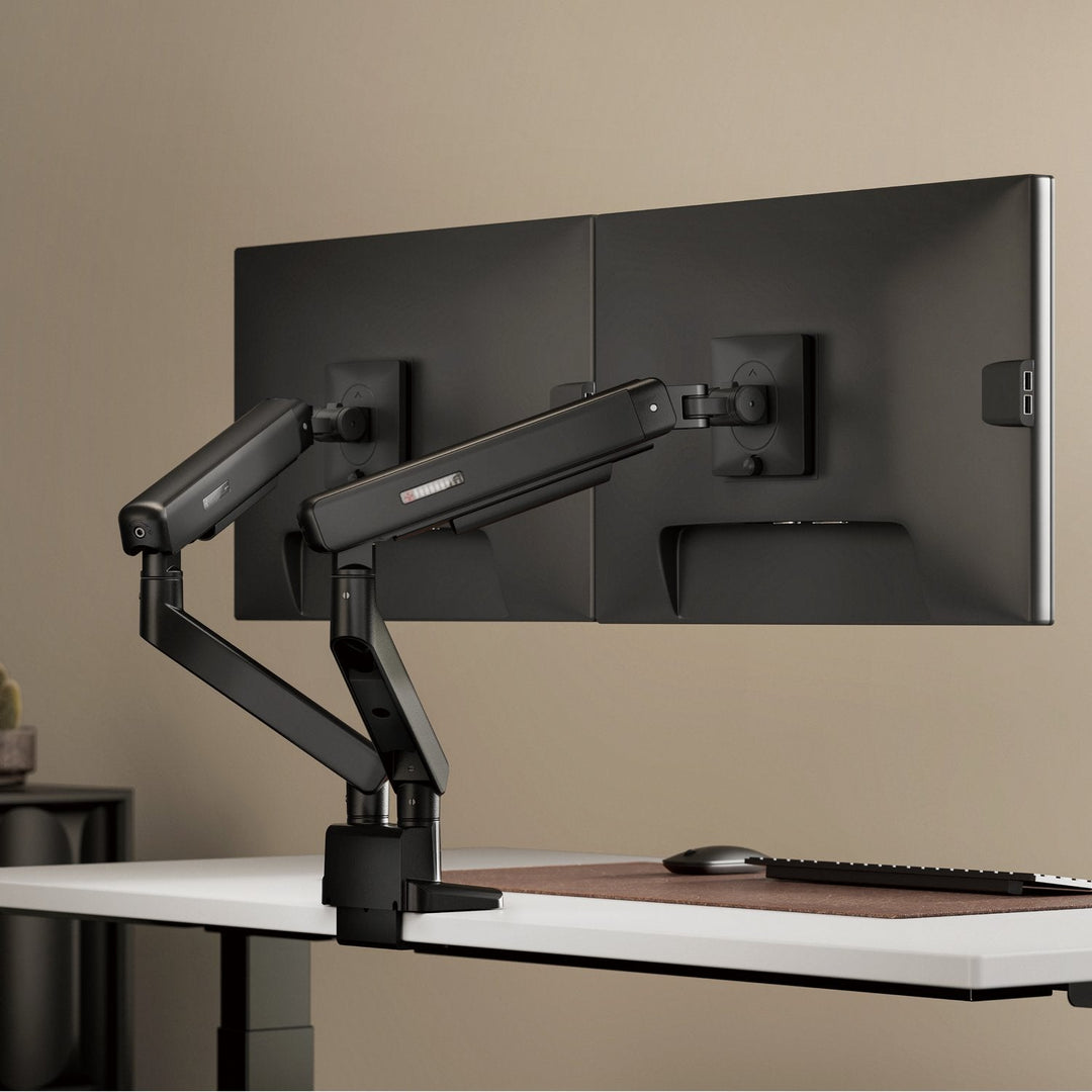 Float Dual Monitor Arm in a desk workspace - Chair Dinkum