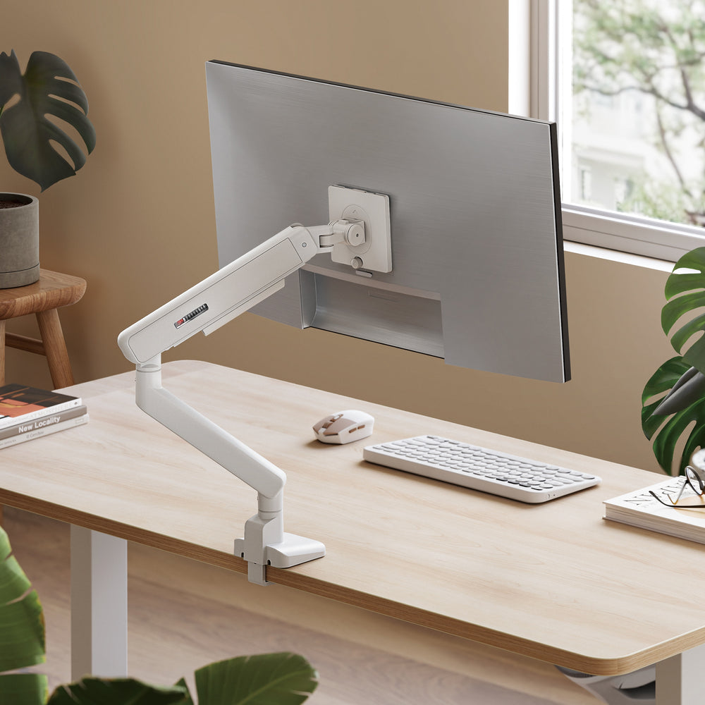 Float Single Monitor Arm on desk with monitor