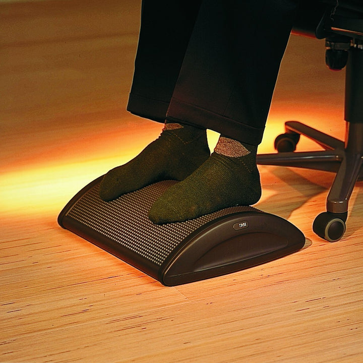 HÅG Quickstep footrest in use on wooden floor - Chair Dinkum