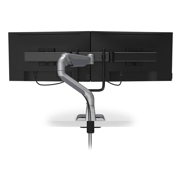 Rear view of a HAT Collective E5 dual crossbar monitor arm in silver with two screens on the crossbar