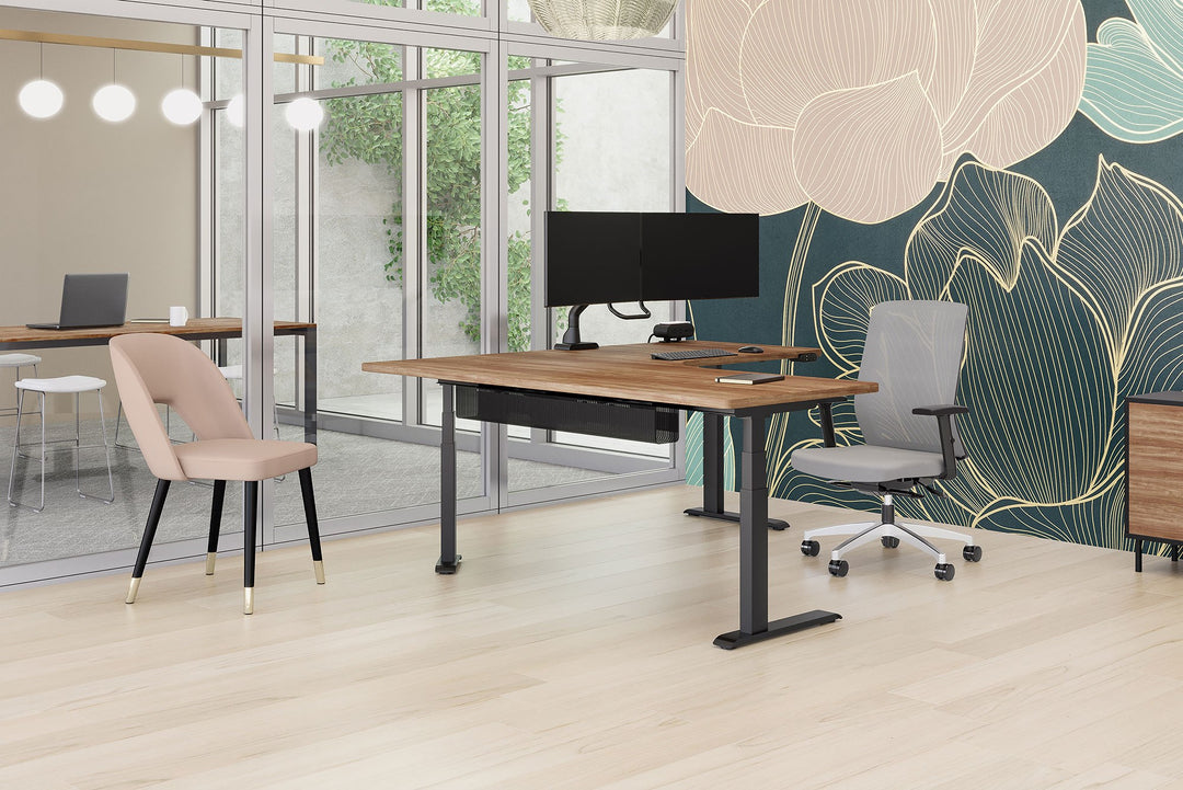 Private office desk fitted with a black HAT Collective E5 dual crossbar monitor arm holding two screens