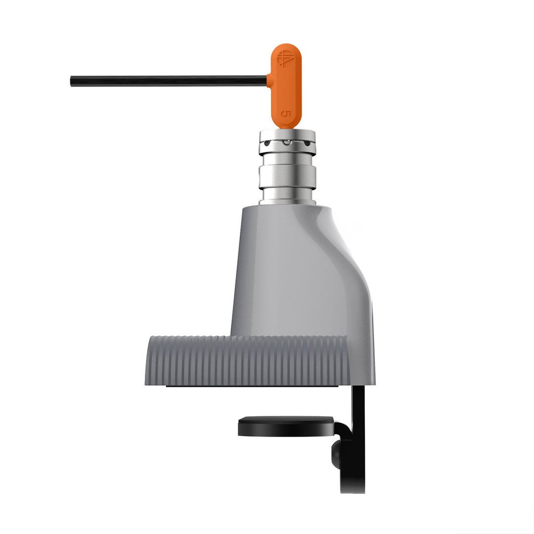 HAT Collective E5 top-down desk mount in a polished finish with the install tool fitted in its storage slot