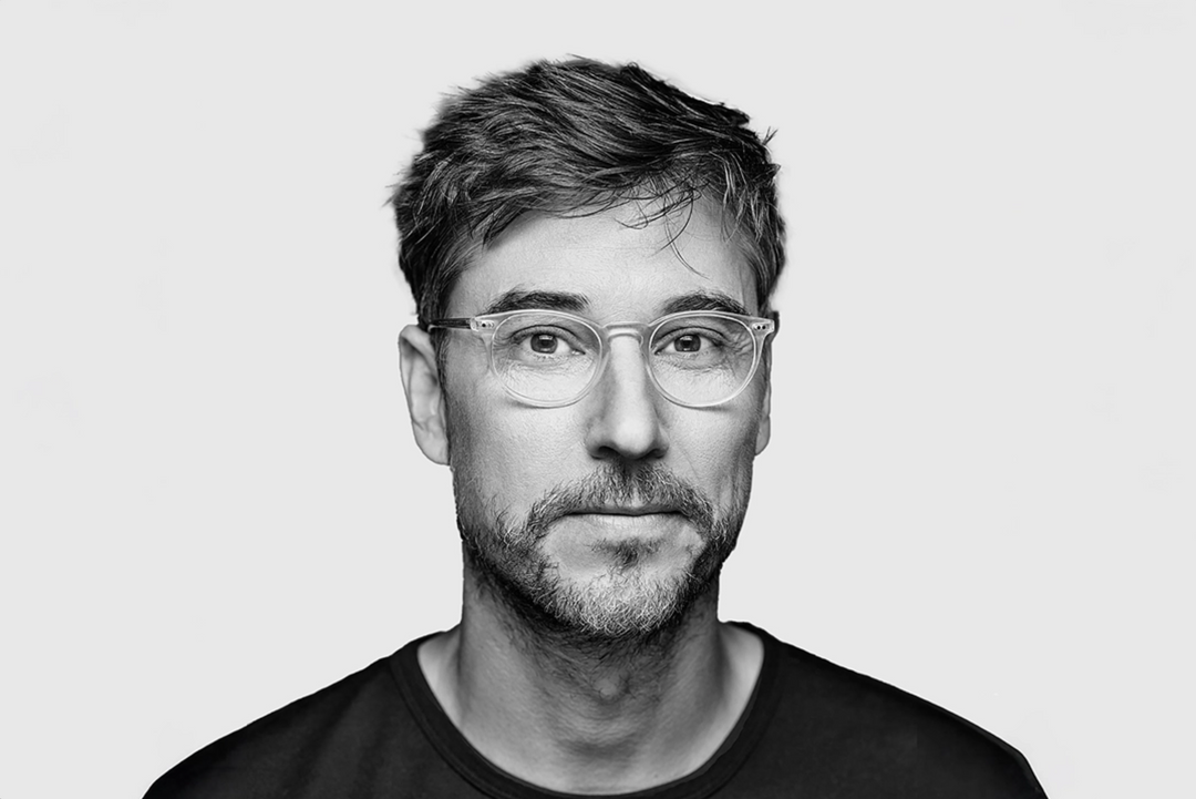 Black-and-white portrait of designer Todd Bracher