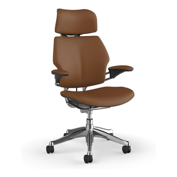 Humanscale Freedom Headrest Chair in Corvara Saddle leather on polished aluminium, front three-quarter view - Chair Dinkum Australia
