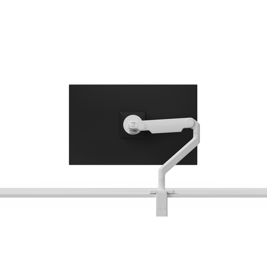 Humanscale M2.1 monitor arm with black trim and desk clamp, no screen, studio render (Humanscale photograph)