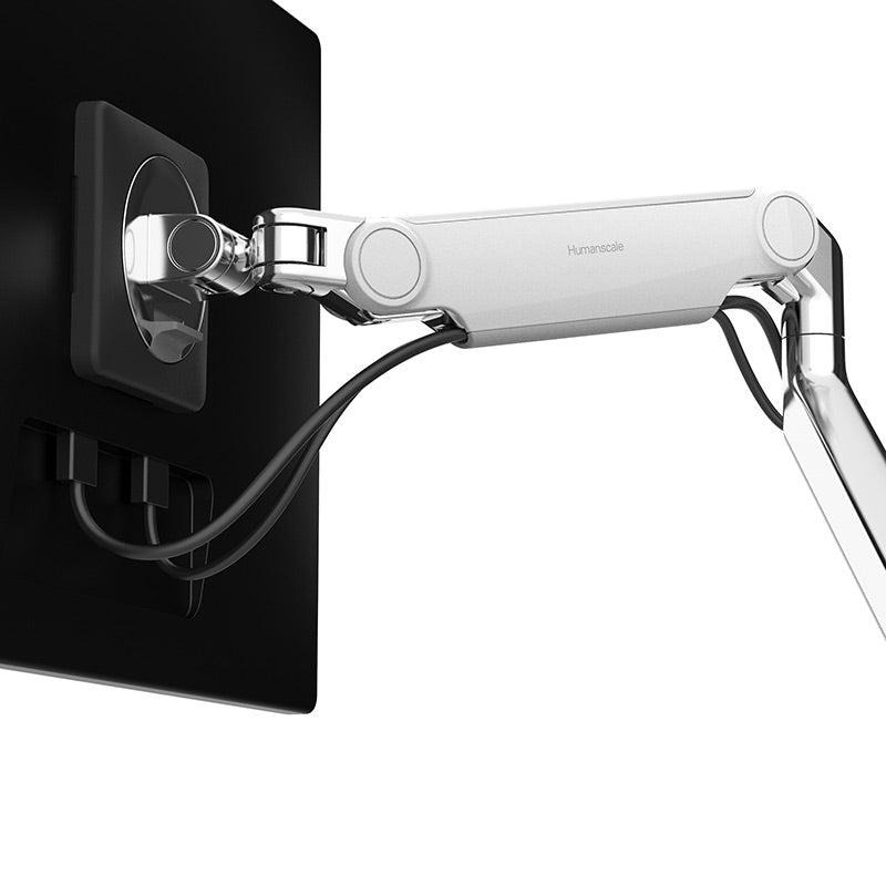 Humanscale M2.1 monitor arm from behind the monitor showing the cable management channel - Humanscale photograph