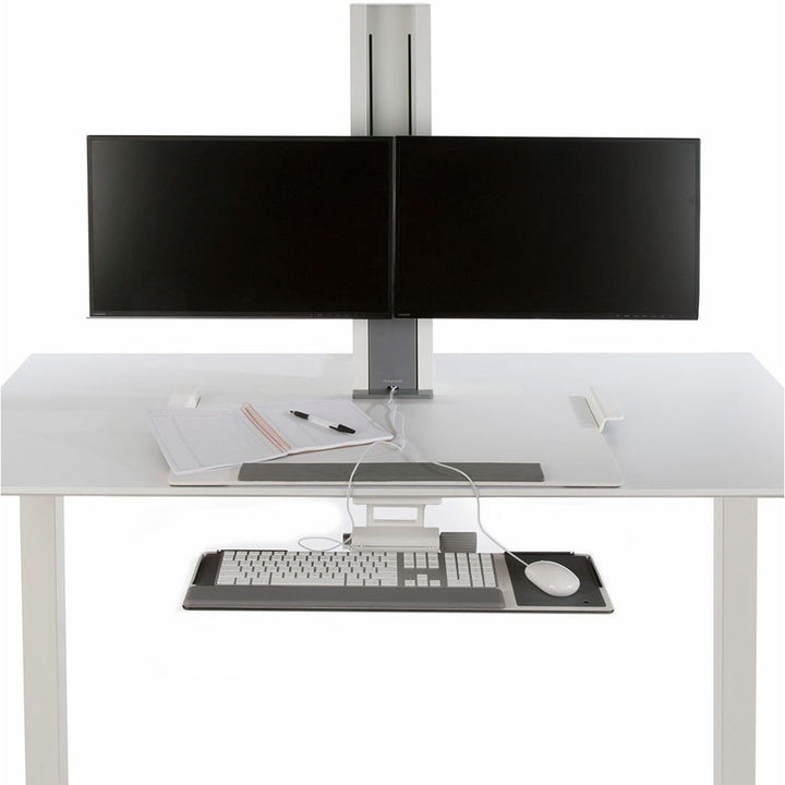Close-up of the Humanscale QuickStand crossbar carrying two screens (Humanscale photograph)