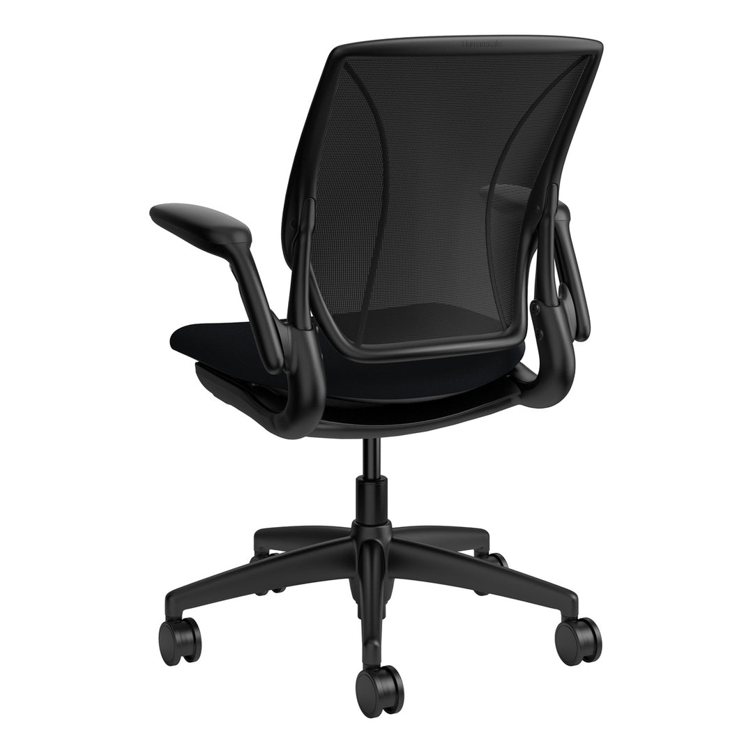 Humanscale World One LM chair with upholstered black seat and black mesh back, adjustable arms, rear three-quarter view - Chair Dinkum Australia