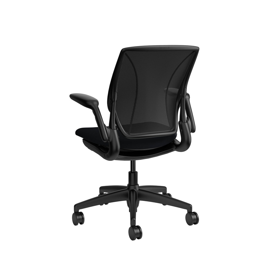 Humanscale World One LM chair with upholstered black seat and black mesh back, adjustable arms, rear three-quarter view - Chair Dinkum Australia