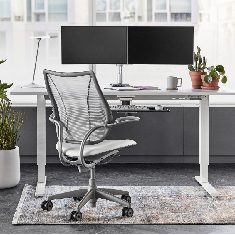 Humanscale World One chair at standing desk with monitor