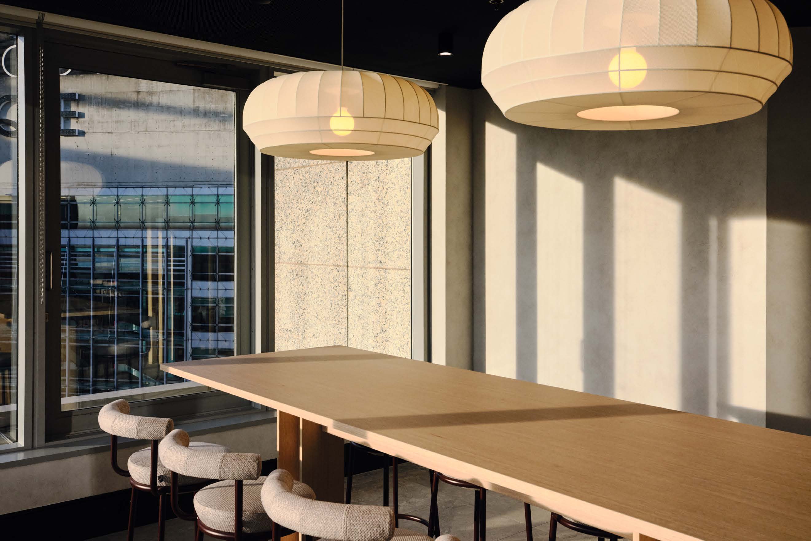 Kyoto ergonomic chairs at a bank of workstations in an open-plan office