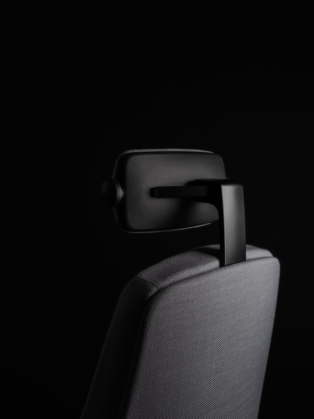 Close-up of the RH Logic 220 Elite neckrest above the upholstered backrest - Chair Dinkum Australia