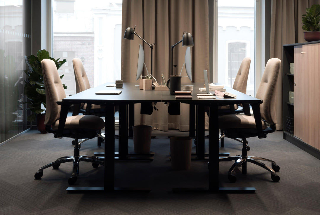 RH Logic 220 chairs at desks in an office with tall curtained windows - Chair Dinkum Australia