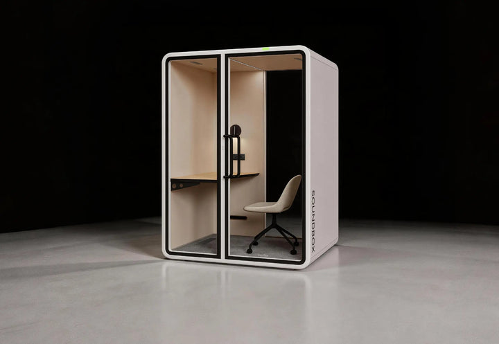 SoundBox VRT M work booth with desk and task chair, three-quarter view in a studio - Chair Dinkum Australia