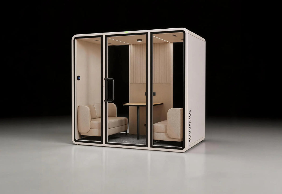 SoundBox VRT ML meeting pod with two sofas and a table, three-quarter view in a studio - Chair Dinkum Australia