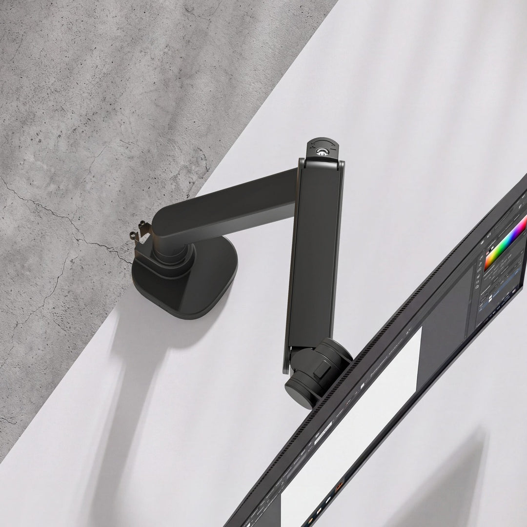 Top-down view of a Thinking Works 2:22 Curve monitor arm and curved screen over a desk
