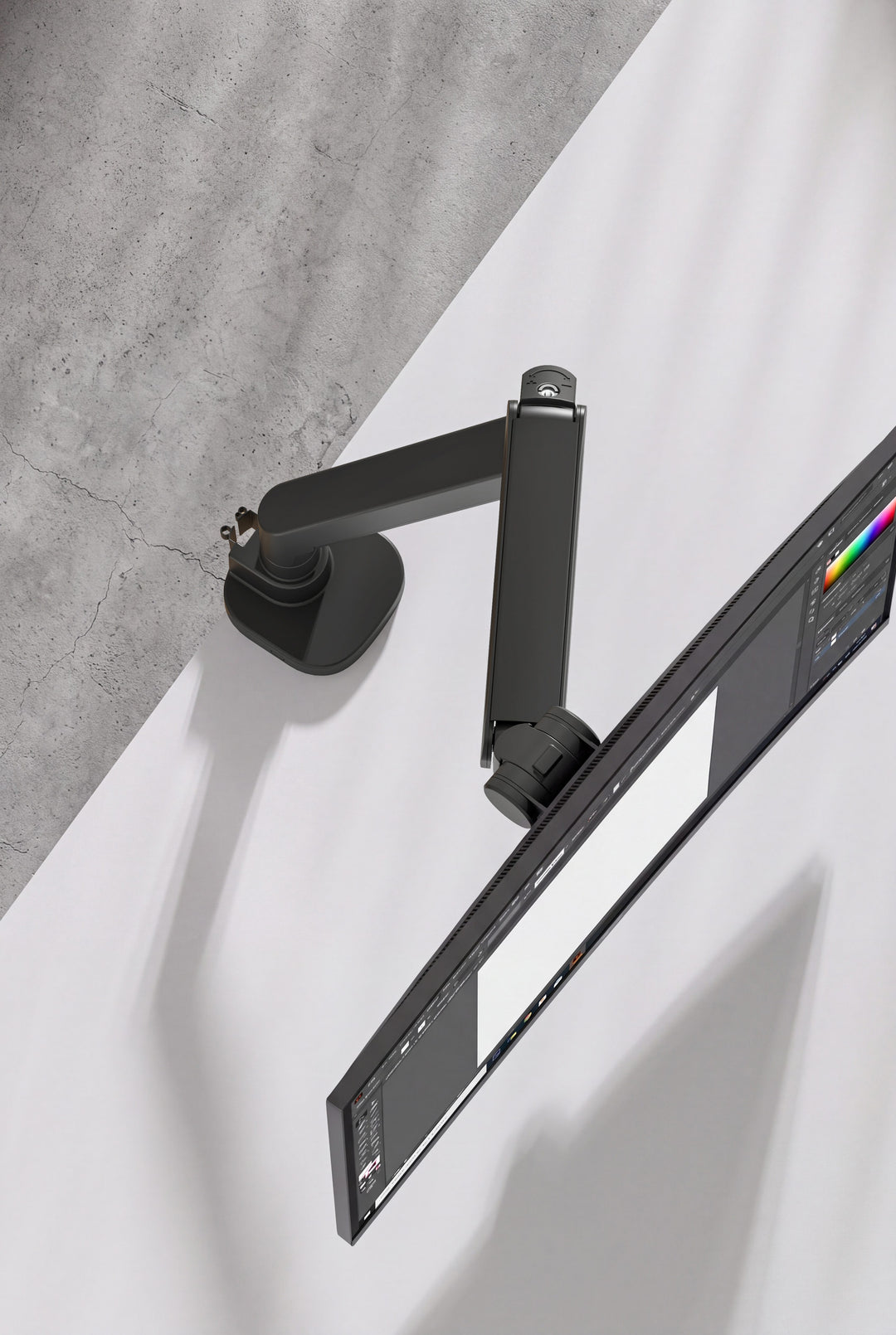 Top-down view of a Thinking Works 2:22 Curve monitor arm and curved screen over a desk