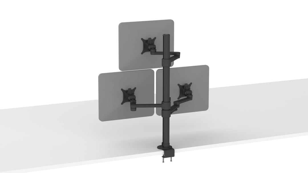 Matte black Thinking Works C.ME post clamped to a white desk, with three arms holding three grey screens, two side by side and one above.