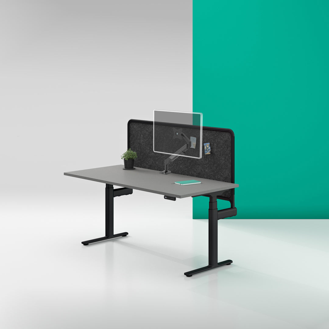 Thinking Works Vader single monitor arm in satin black on a desk - Thinking Works photo