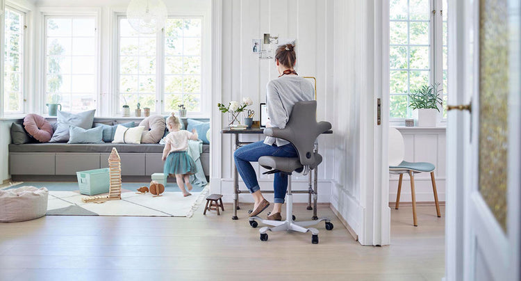 HAG Capisco chair in home office environment - Chair Dinkum