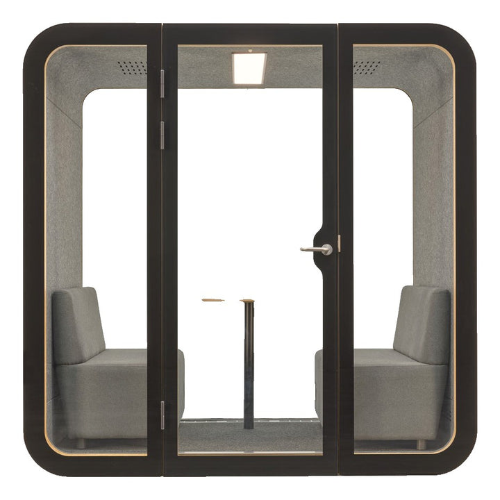YADO 220 meeting pod front view: black glass front with a centre door, two facing sofas and a table inside - Chair Dinkum Australia