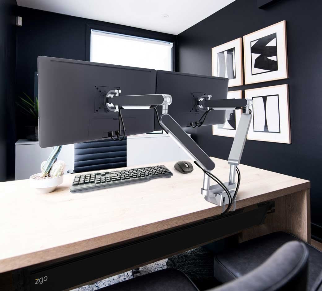 ZGO monitor arm on dark desk with ultrawide monitor
